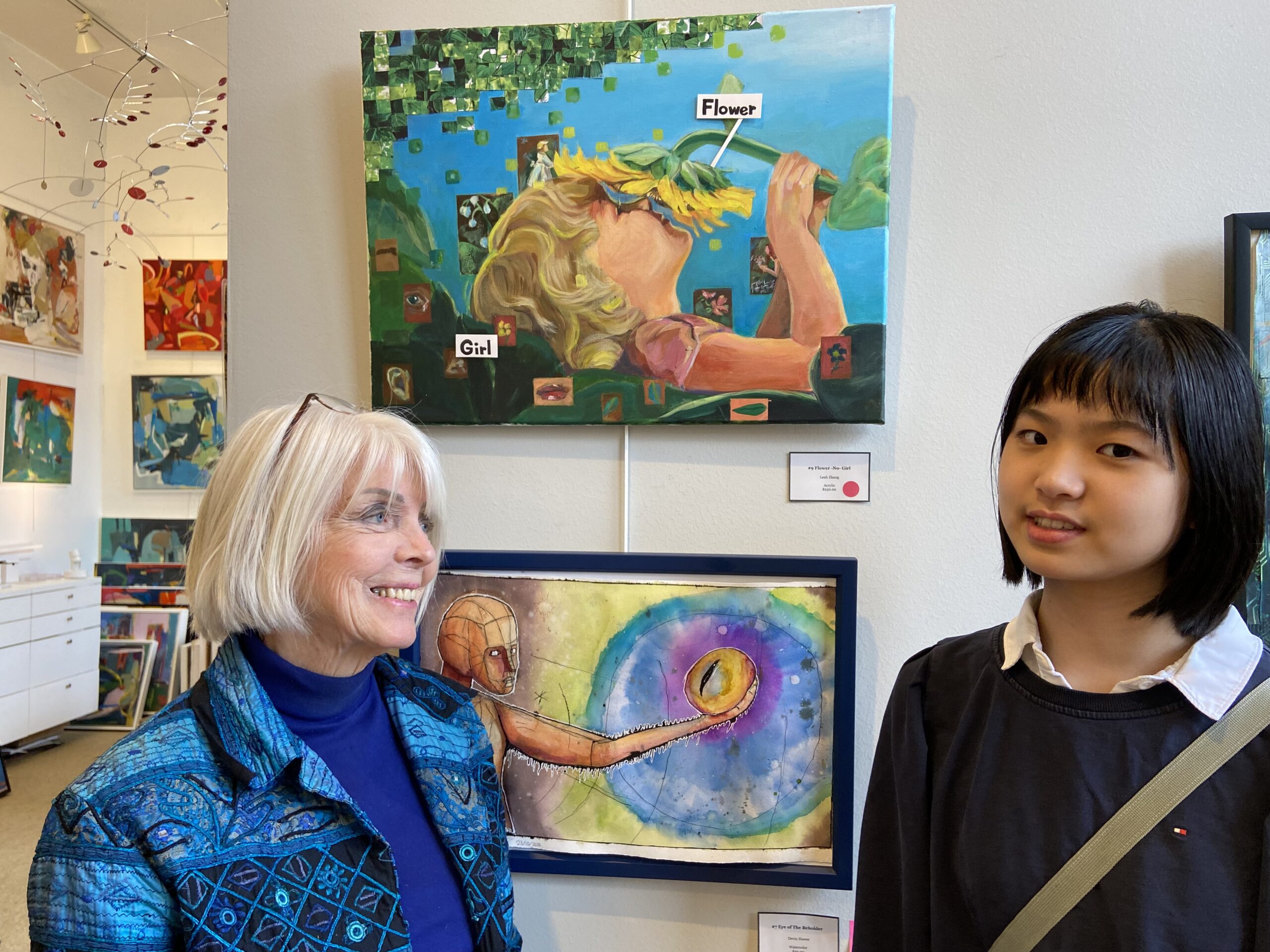 Pat Macintyre, artist and owner of Reston Art Gallery and Studios, with Leah Zhang, organizer of the pop-up art exhibition, 