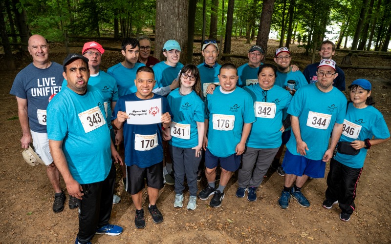 group photo of runners and walkers of the Special Olympics team