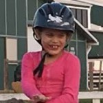 Paloma loves to horseback ride.
