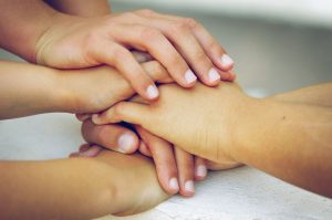 Hand holding and support image: come to our new support group